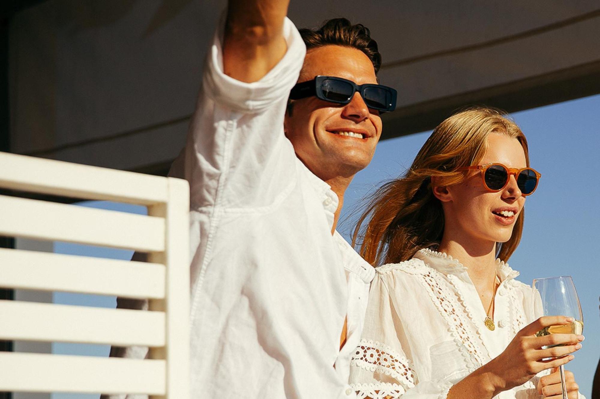 Domes Lake Algarve, Autograph Collection Vilamoura Exterior foto A couple wearing sunglasses