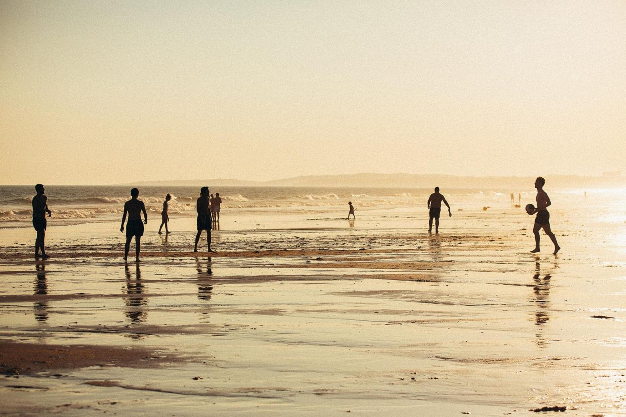Domes Lake Algarve, Autograph Collection Vilamoura Exterior foto Children playing football on the beach